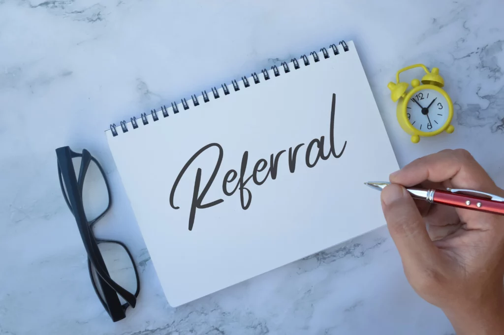 Calligraphy of a referral program sign.